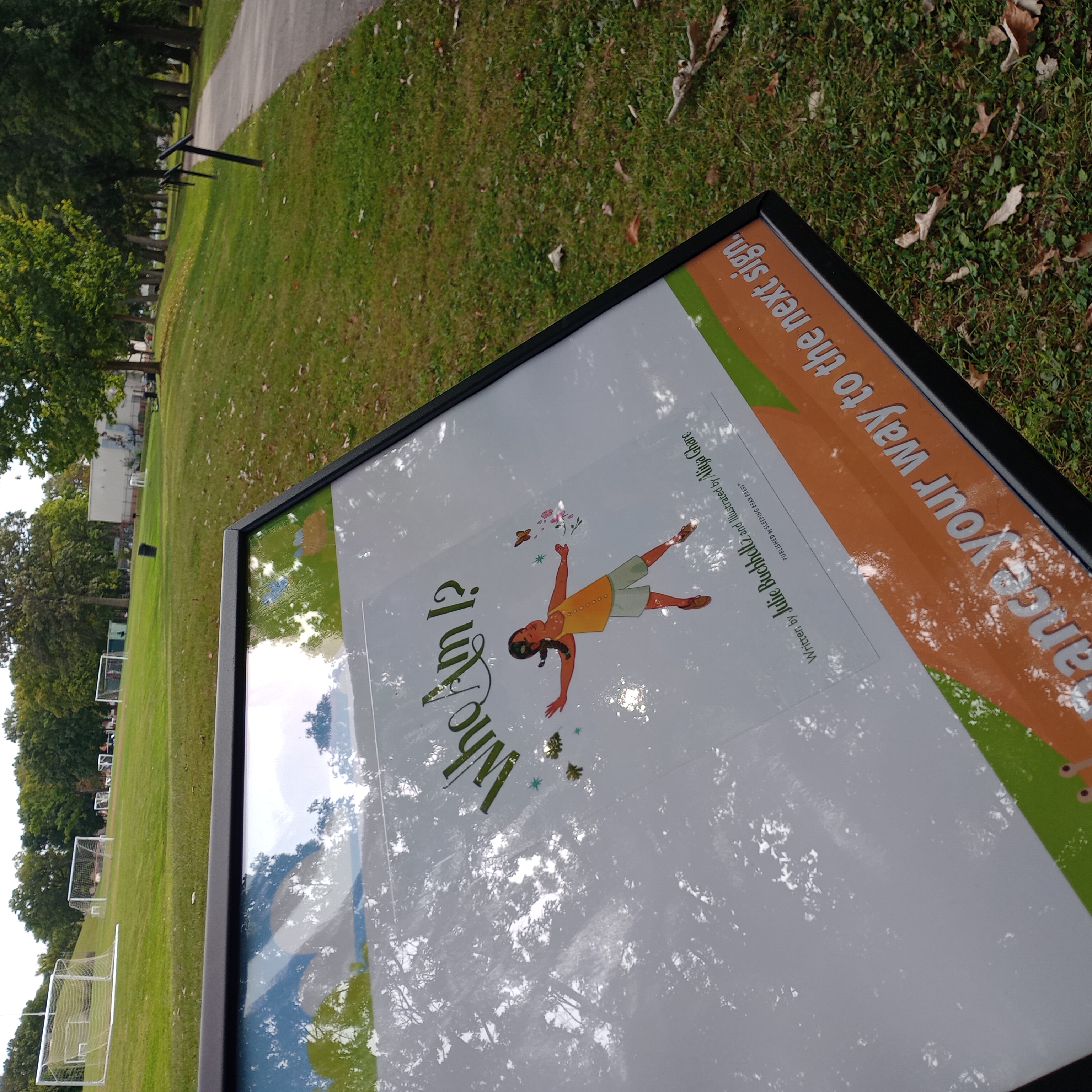 Sign 2 with a view along the Story Trail